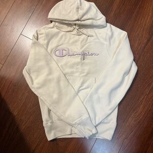 Cream champion hoodie with purple lettering XS